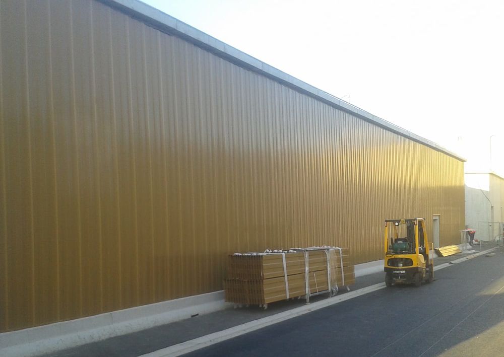Road project with wall cladding